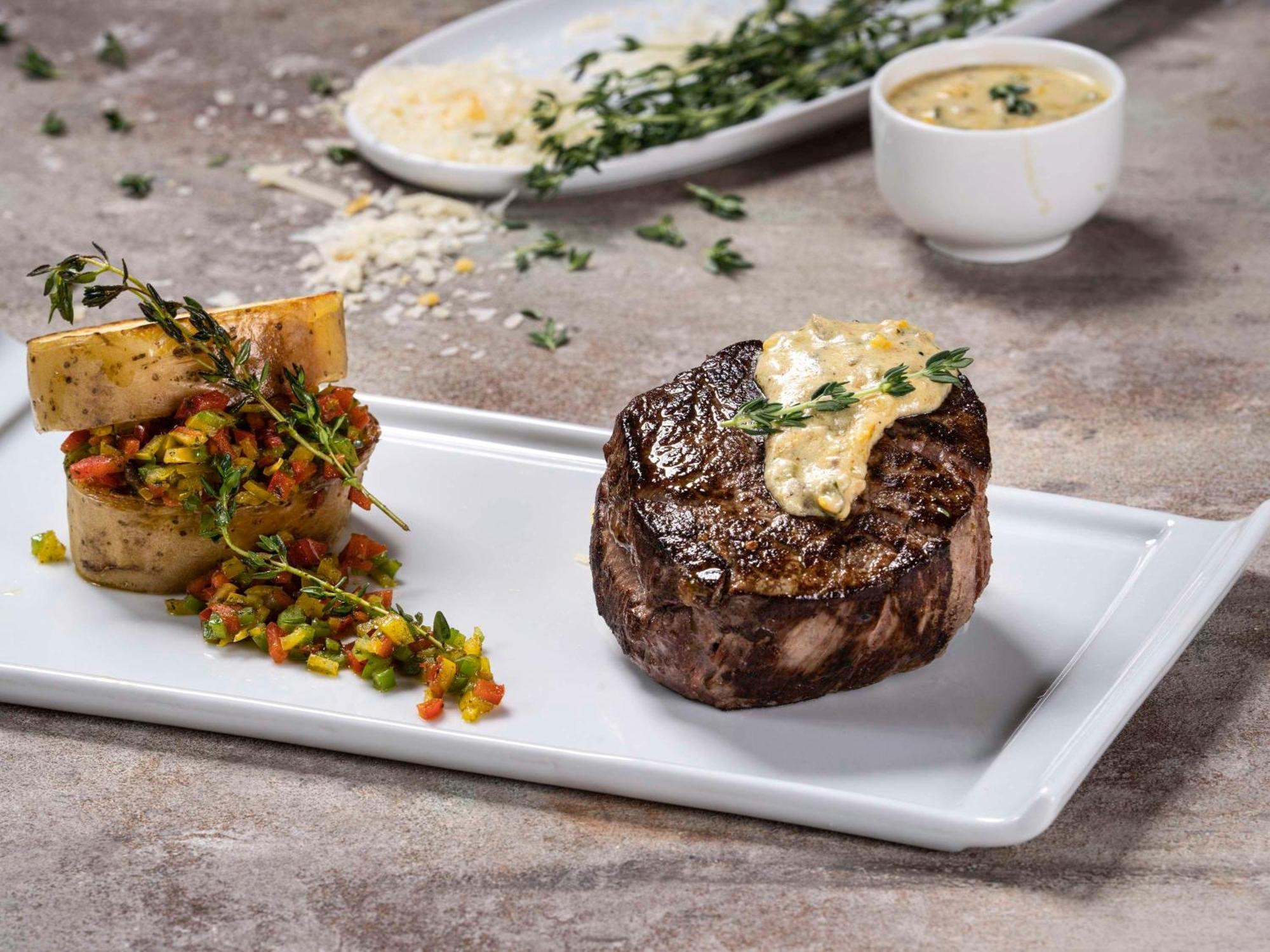 Movenpick Hotel And Residences Riyadh Luaran gambar A steak prepared with a butter sauce