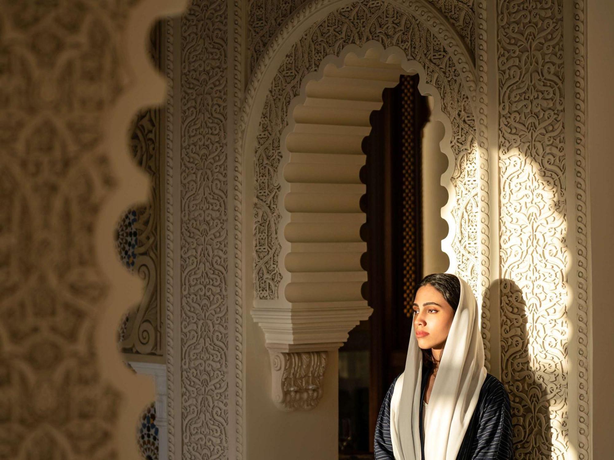 Movenpick Hotel And Residences Riyadh Luaran gambar A Moroccan woman in traditional dress